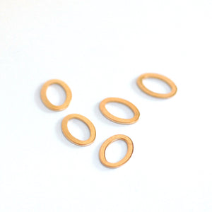 Tiny metal links, oval shaped donuts for making jewelry, earring components, copper, brass, broze